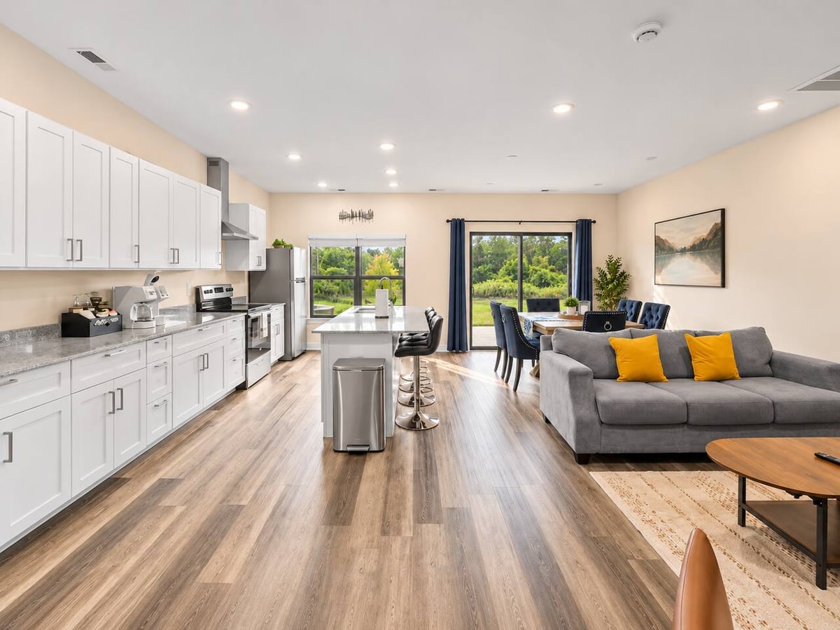 The open-plan kitchen and living room at The Charlotte Townhouse in Charlotte, NC